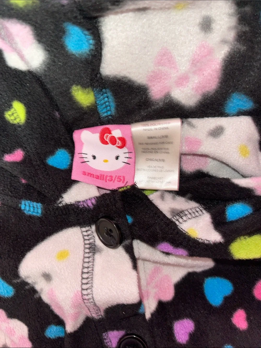 Hello Kitty Black Fleece Hooded Pajama Onesie with Pink Bow Accents